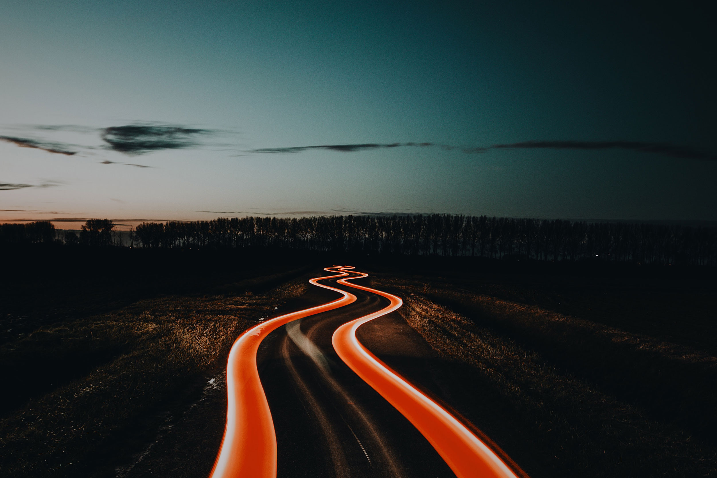 Time lapse photo of a highway at dusk