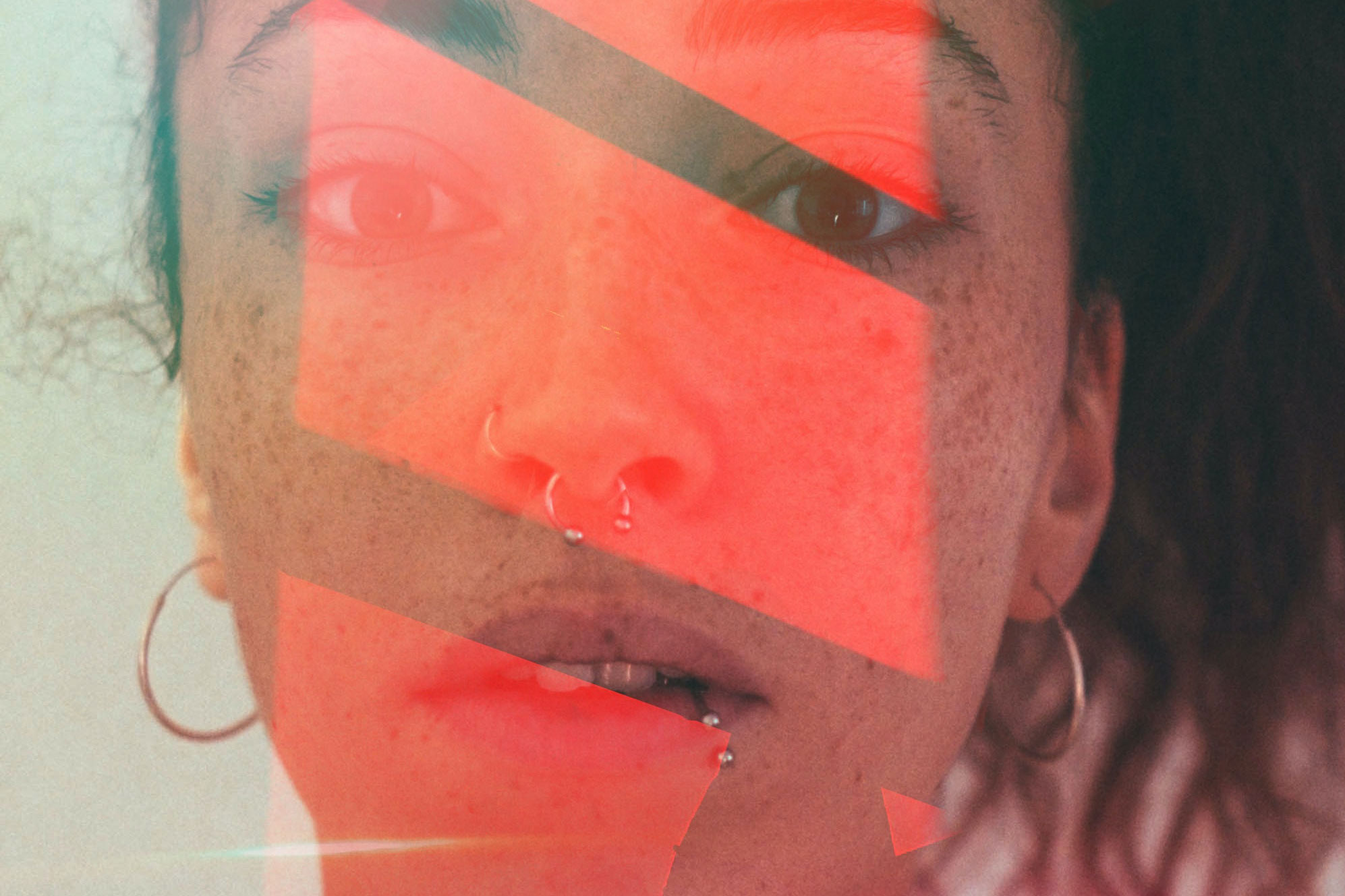 Face with reflection superimposed.