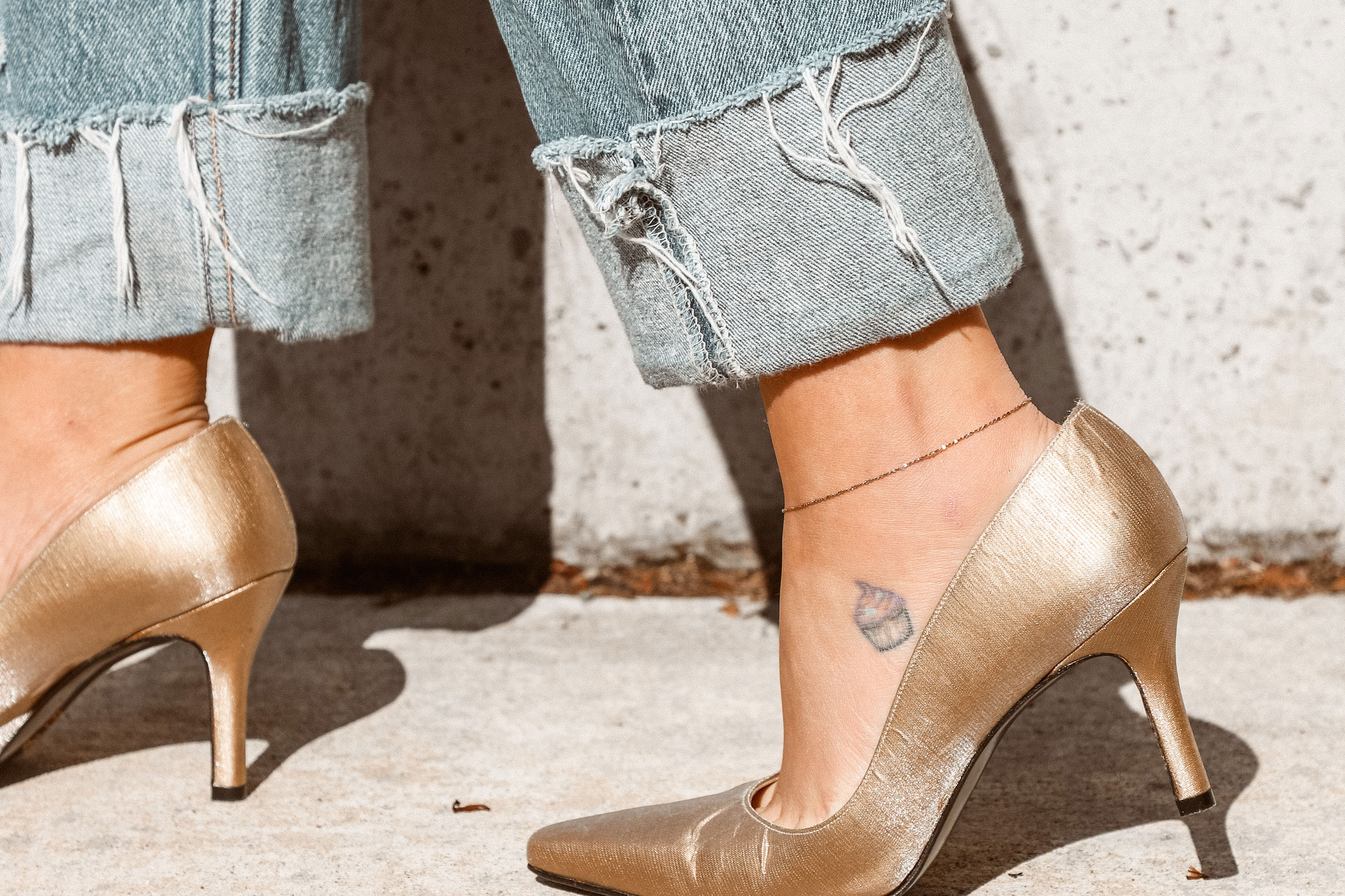 High heels and a cupcake tattoo