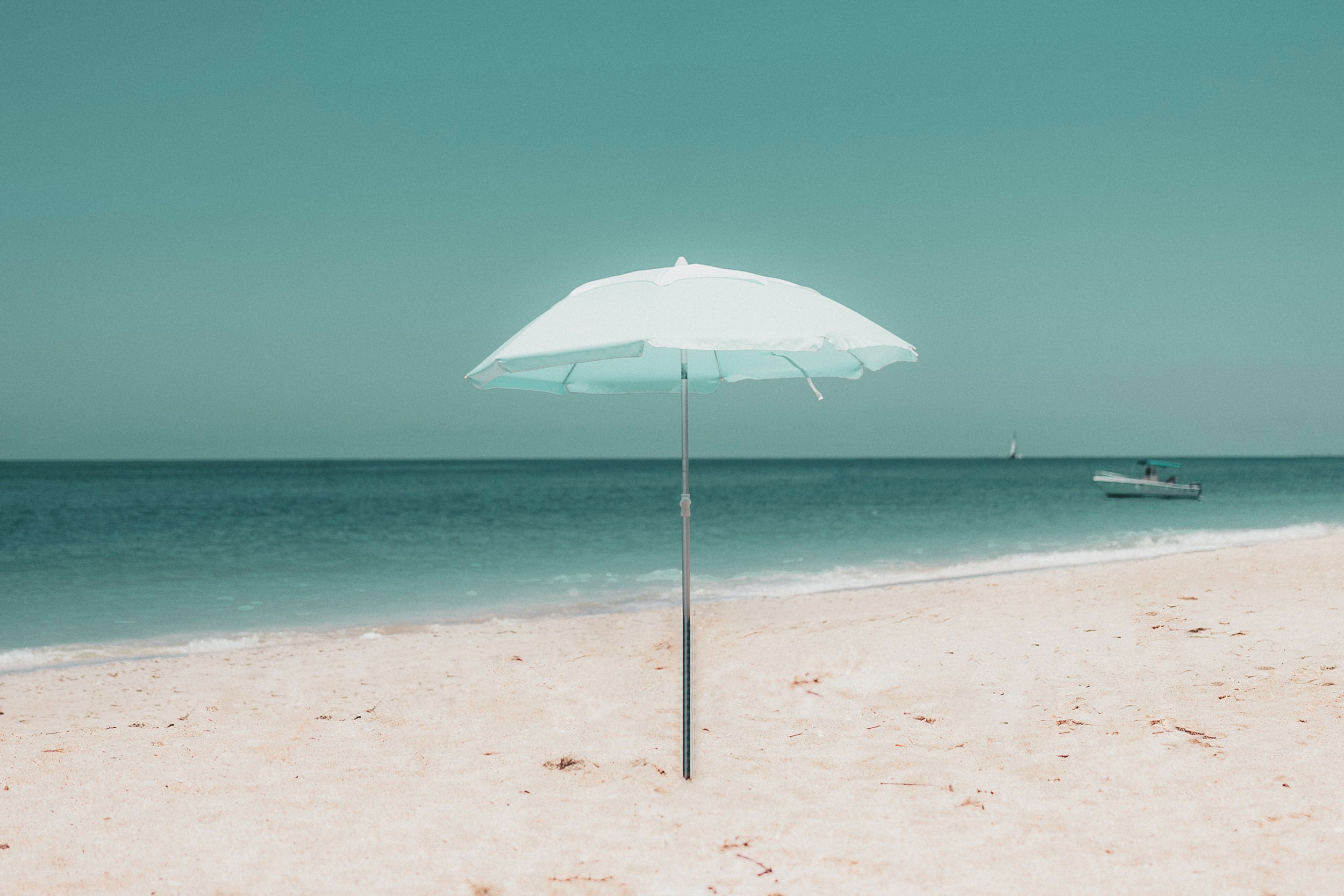 White umbrella on beach